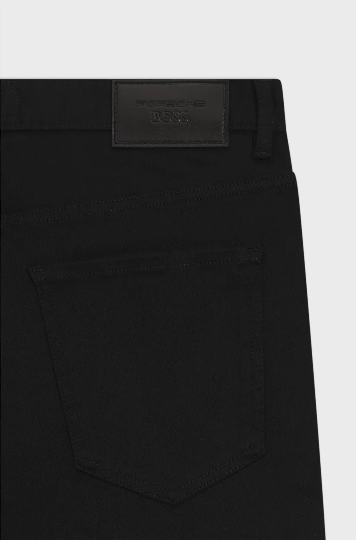 TAPERED-FIT JEANS IN BLACK STRETCH DENIM