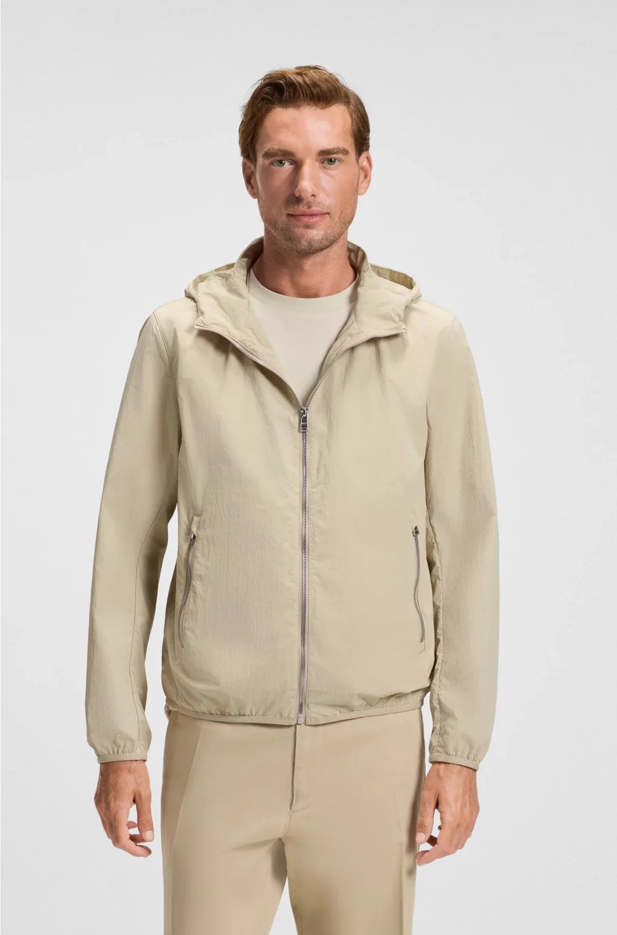 WATER-REPELLENT JACKET IN CRINKLE FABRIC WITH ADJUSTABLE HOOD
