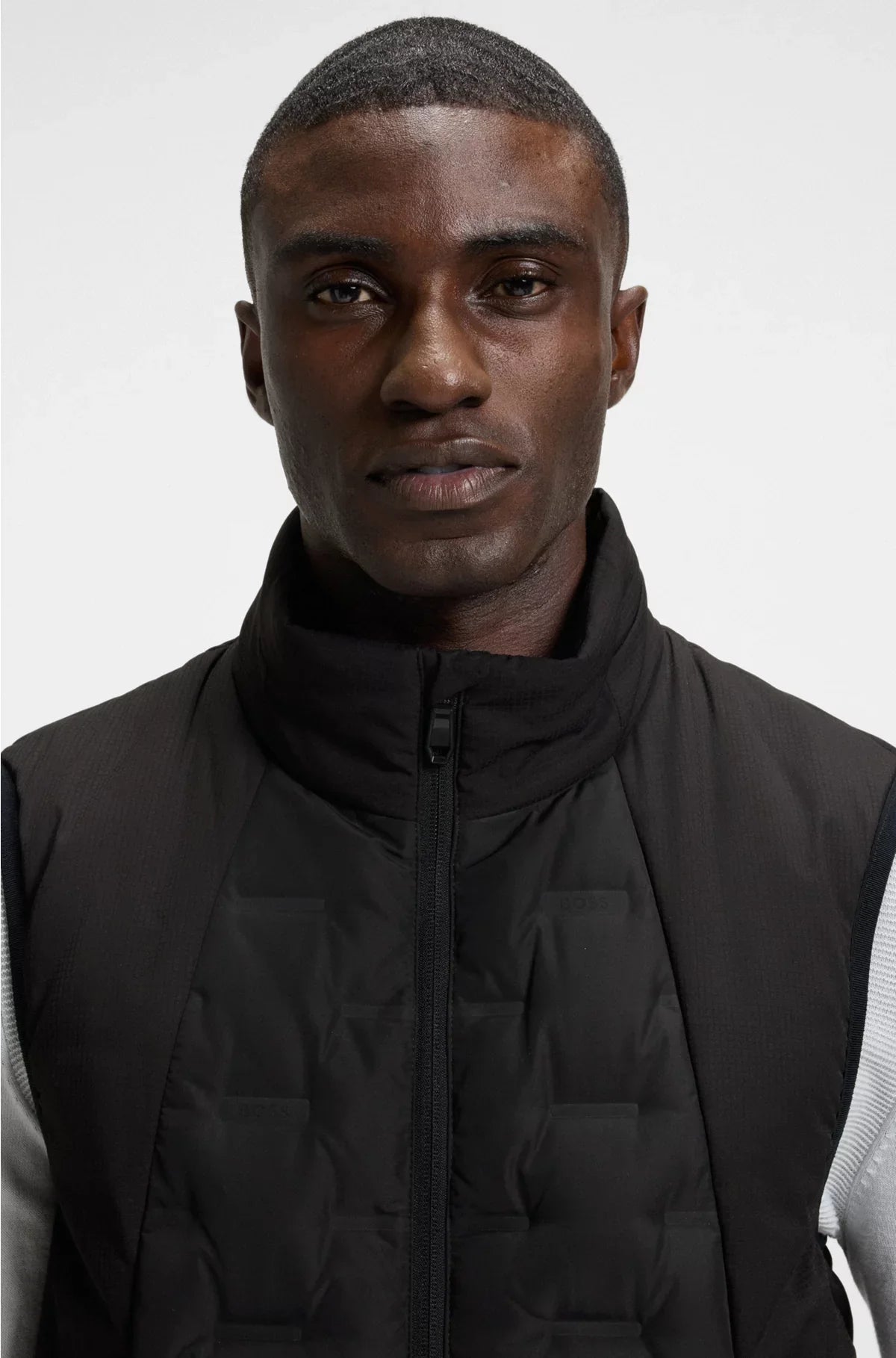 DOWN-FILLED GILET WITH WELDED-LOGO PATTERN