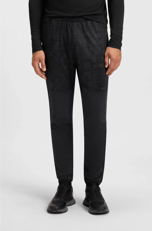 ACTIVE TRACKSUIT BOTTOMS IN GRAPHIC-PRINT PERFORMANCE FABRIC