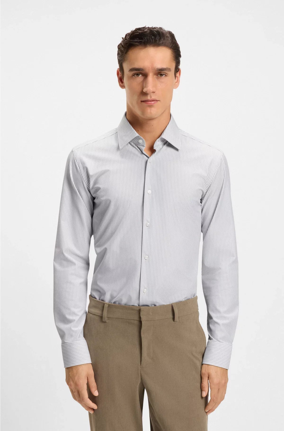SLIM-FIT SHIRT IN STRIPED PERFORMANCE-STRETCH FABRIC