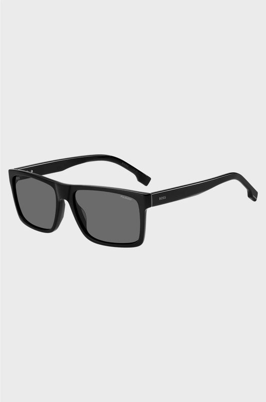 OCCHIALI DA SOLE IN ACETATO NERO CON LOGO INCISO