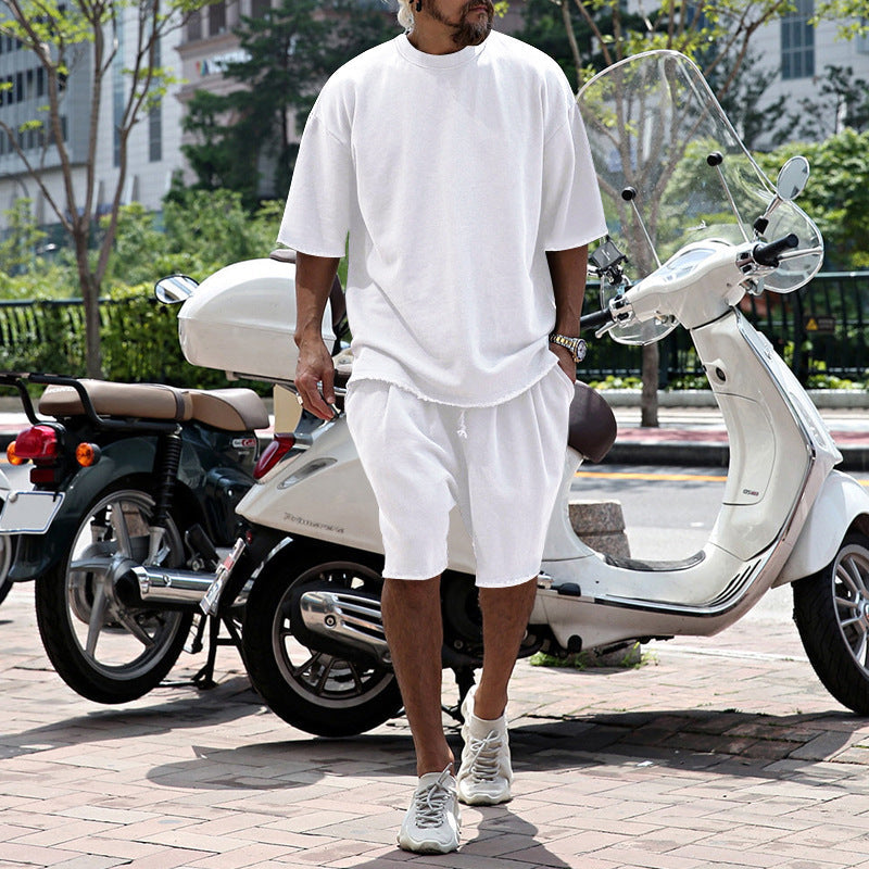 Completo da uomo due pezzi casual tinta unita con pantaloncini